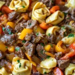 Cheesesteak-Tortellini in reichhaltiger Provolonesauce